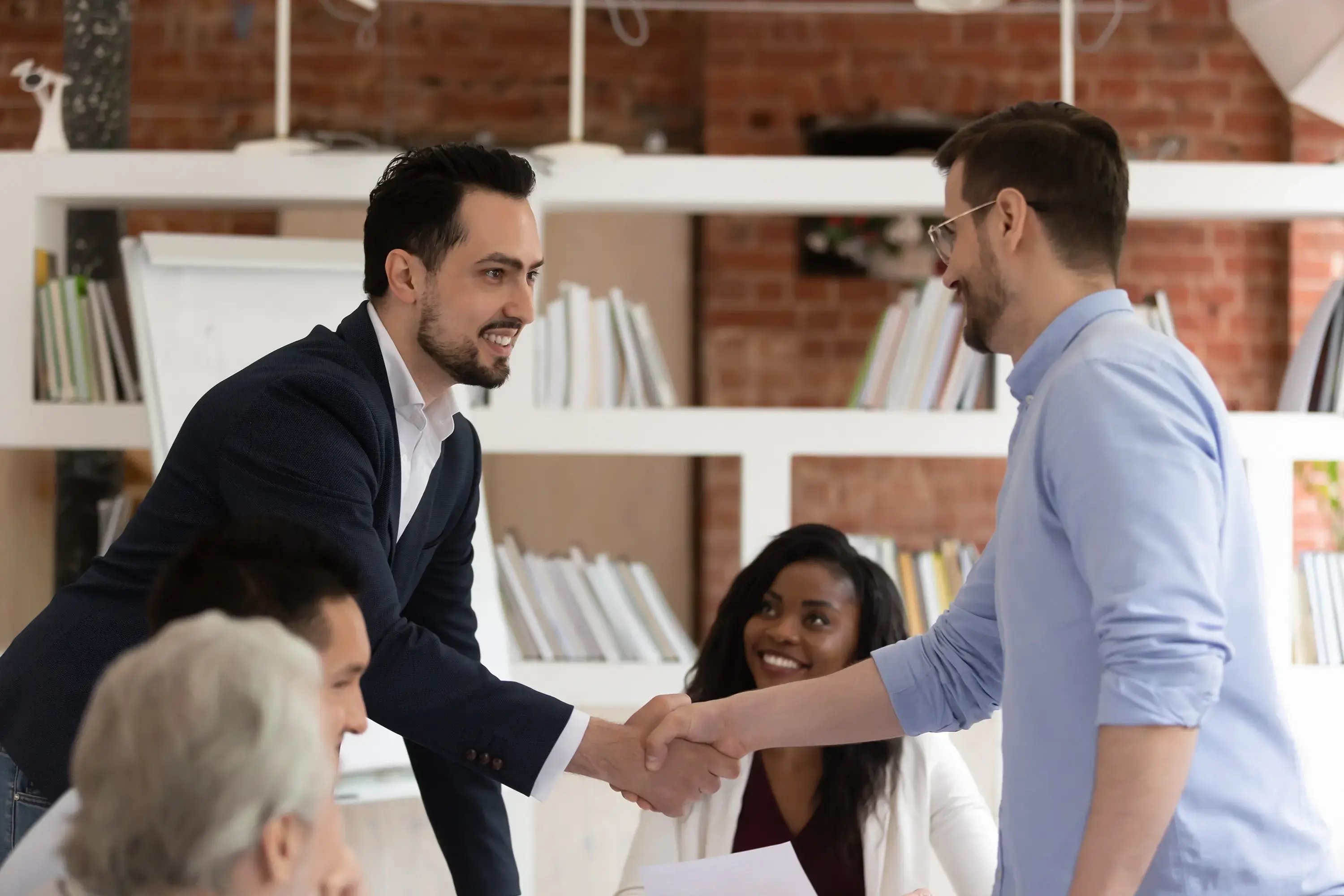 img-SHU_1511399792-business-people-handshake